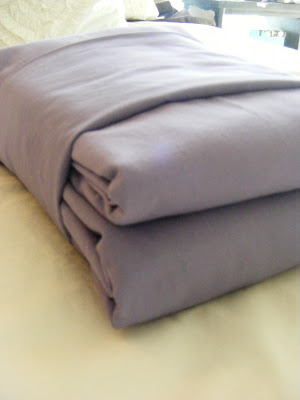 How To Fold a Fitted Sheet and Other Laundry Hacks You Should Know