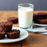 chocolate krispie cakes with cocoa powder
